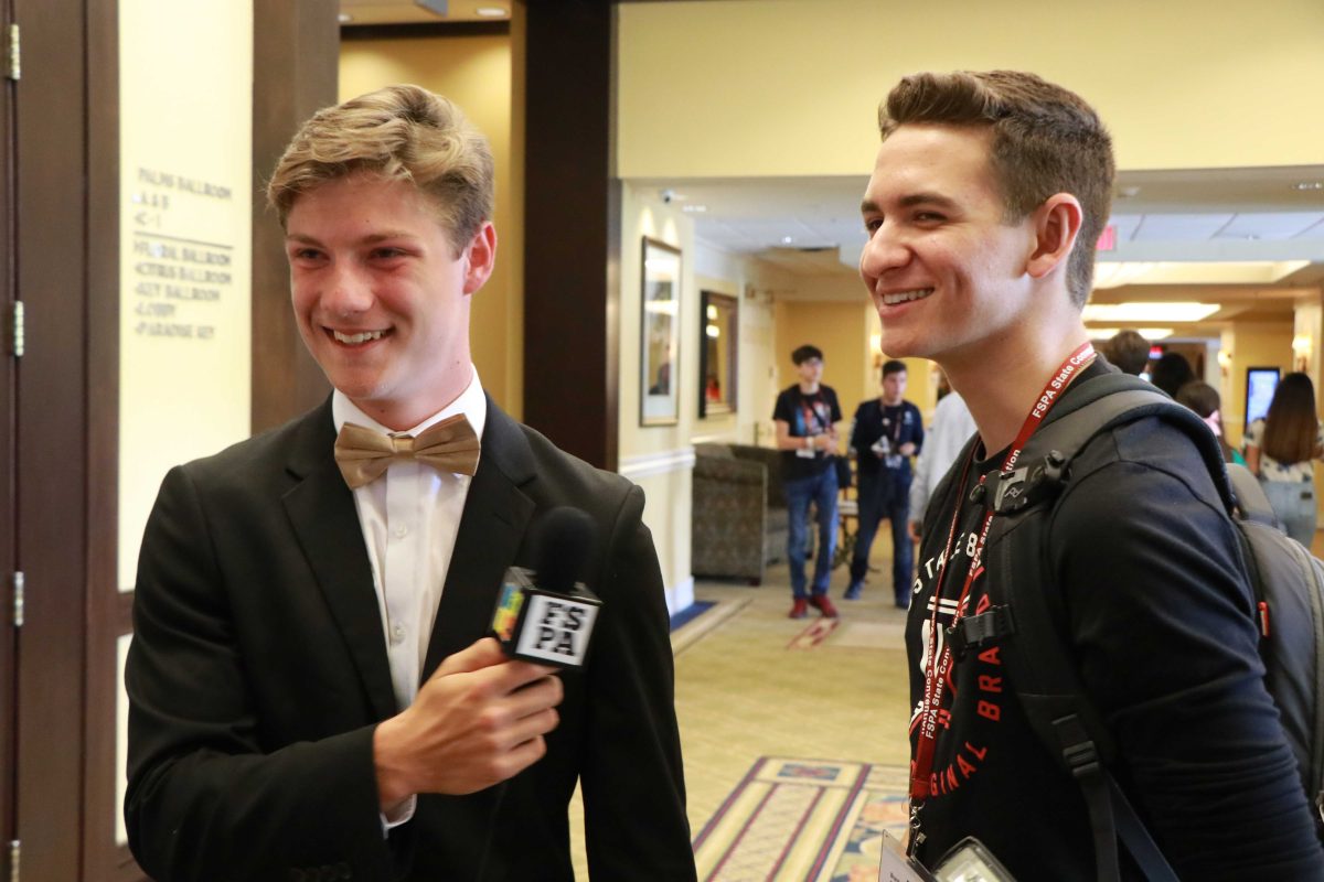 Sophomore Brandon Woods is interviewed by a fellow broadcaster at the Florida Scholastic Press Association convention. Journalists from across the state participated in the "Man on the Street" contest. (Photo/Joanne Haner)