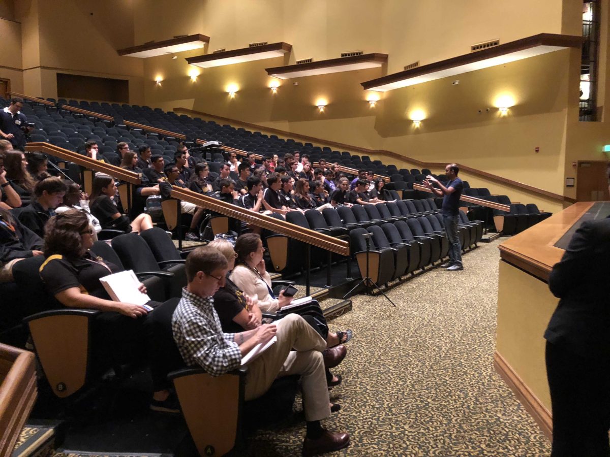 Ray Dass breaks the news to the class of 2019 national merit scholar semifinalists. (Photo/Joanne Haner)