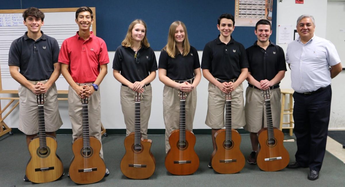 These six students will perform as part of the All-State Guitar ensemble in January 2019. From left to right: juniors Grant Seizmore and Jacob Kasner, sophomore Jordyn Kurlander, senior Sarah Ham and sophomores Ian Laor and Matthew Garbarino. (Photo submitted by Jacob Kasner)