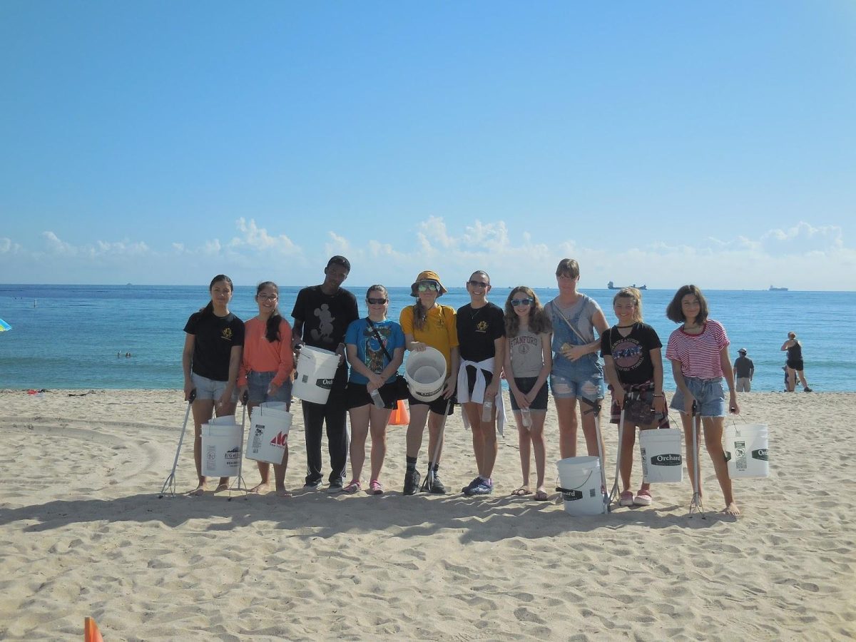 Members from the Marine Biology club gather to help save the environment at a beach cleanup which took place Nov. 10 at Ft. Lauderdale beach. (Photos/Ms. Connie Versteeg)