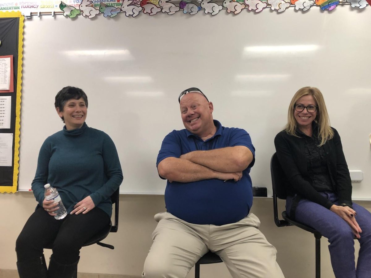 (Left to right) Mrs. Blum, Dean Nolle and Mrs. Buchalter prepare to answer students’ questions in the packed room before them. (Photo/Kristen Quesada)