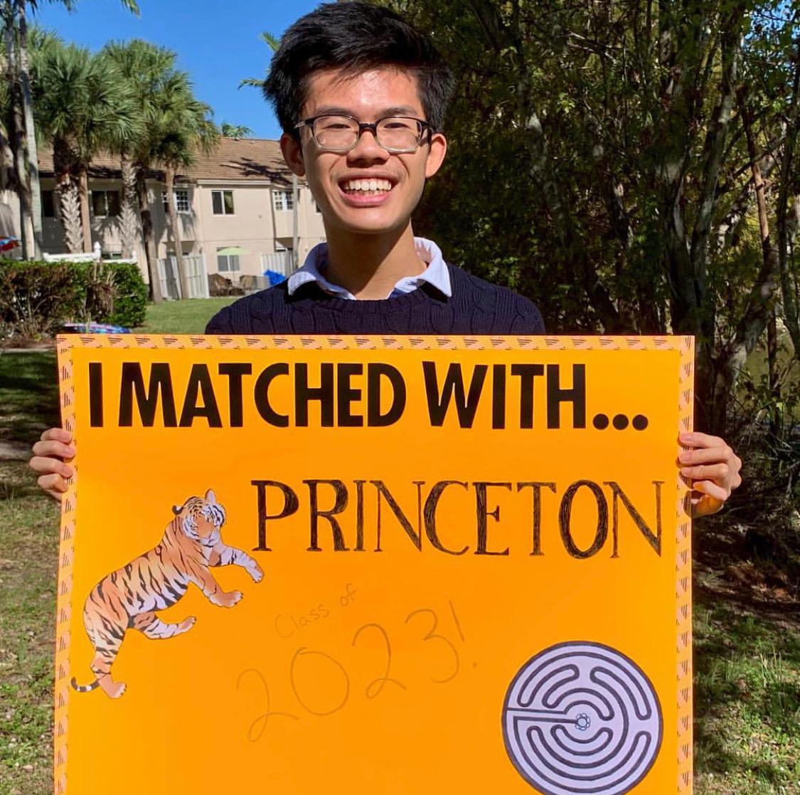 Yeung displays his celebratory poster of being marched with Princeton University. (Photo submitted/Kevin Yeung)