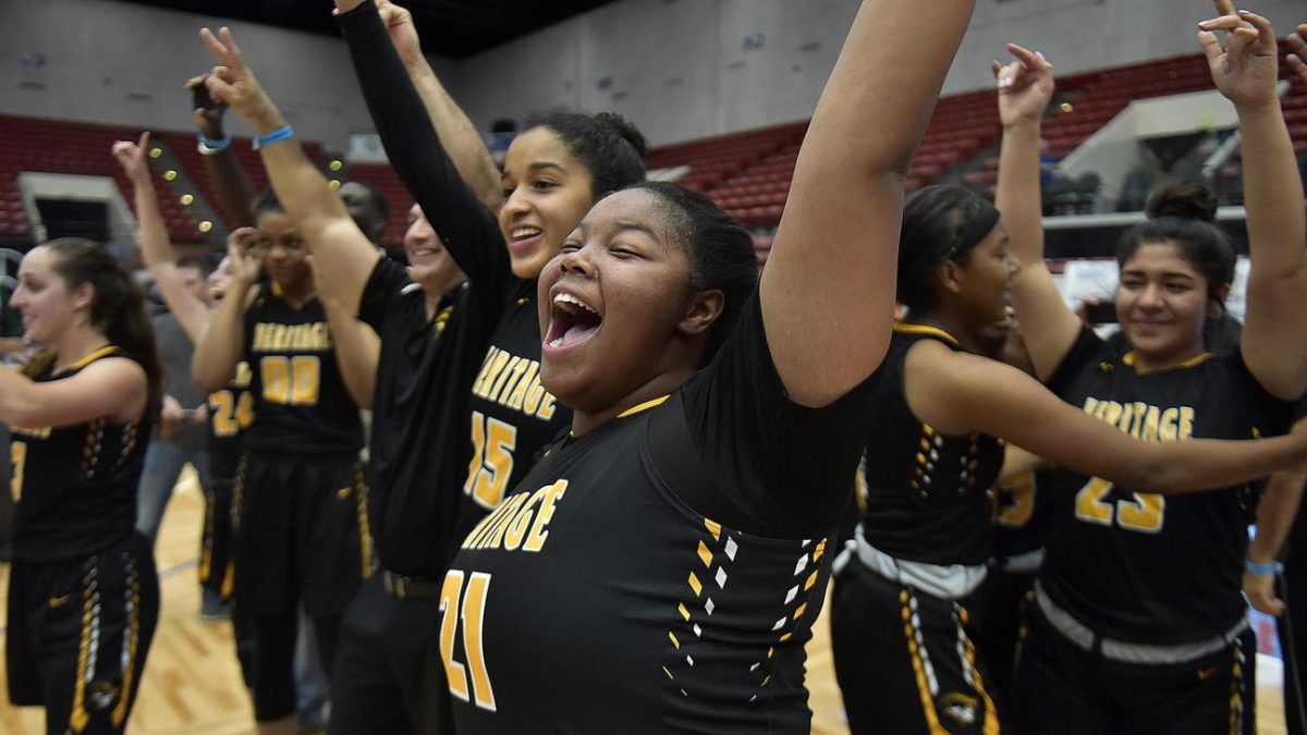 Last year’s championship team celebrates their state title victory after defeating Ponte Vedra 59-33. (Photo/Michael Laughlin)