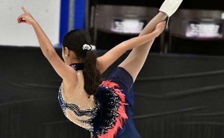 Amal Israilova skates to first place