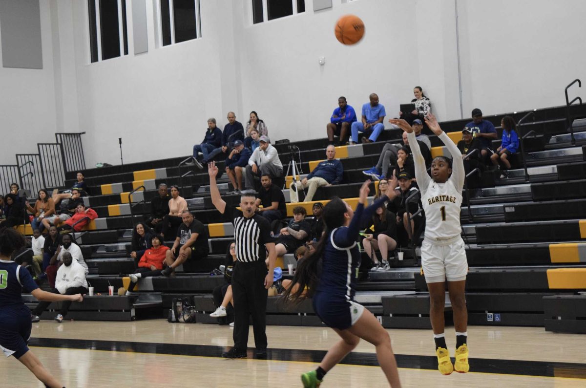 Varsity basketball girls avoid getting slammed by SLAM Miami