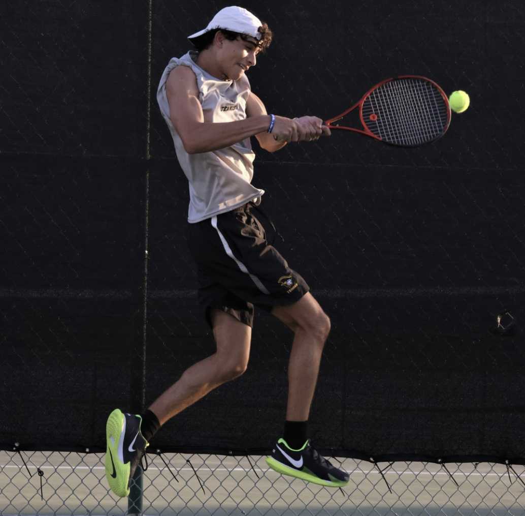 In full swing: varsity tennis defeats Archbishop McCarthy