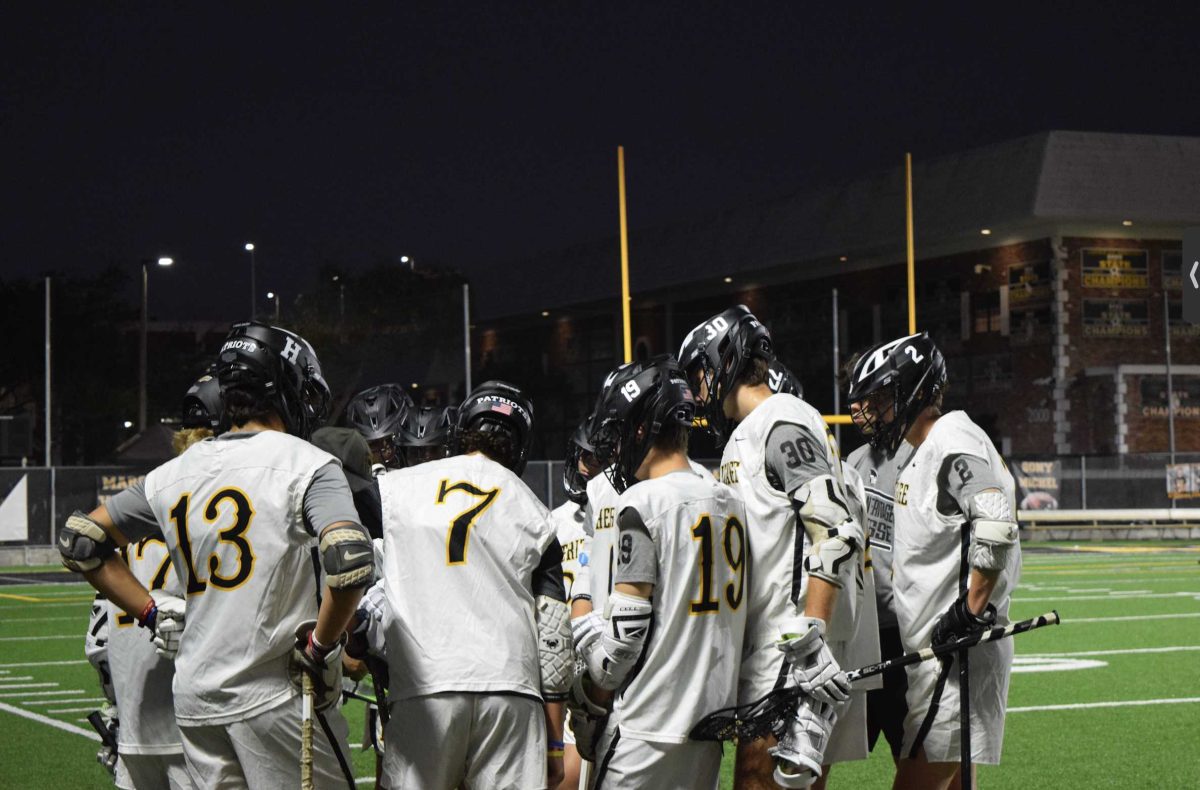 Varsity boys lacrosse defeats Martin County 15-4