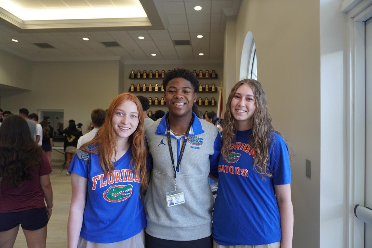 Left to right: Addie Esler, Noah Duro-Andre and Maayan Feldman represent the University of Florida at the breakfast. 
